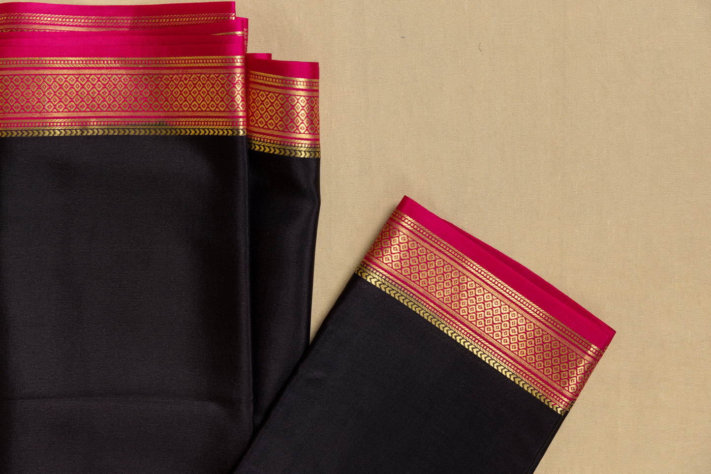 Black and pink mysore silk saree with gold border