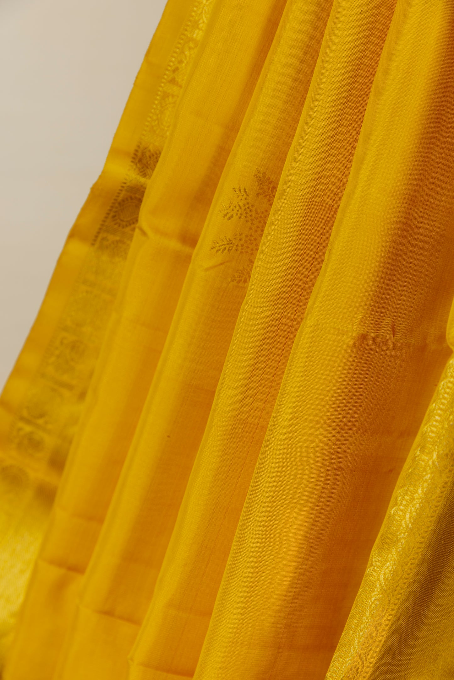 Yellow and gold Kanjivaram silk saree