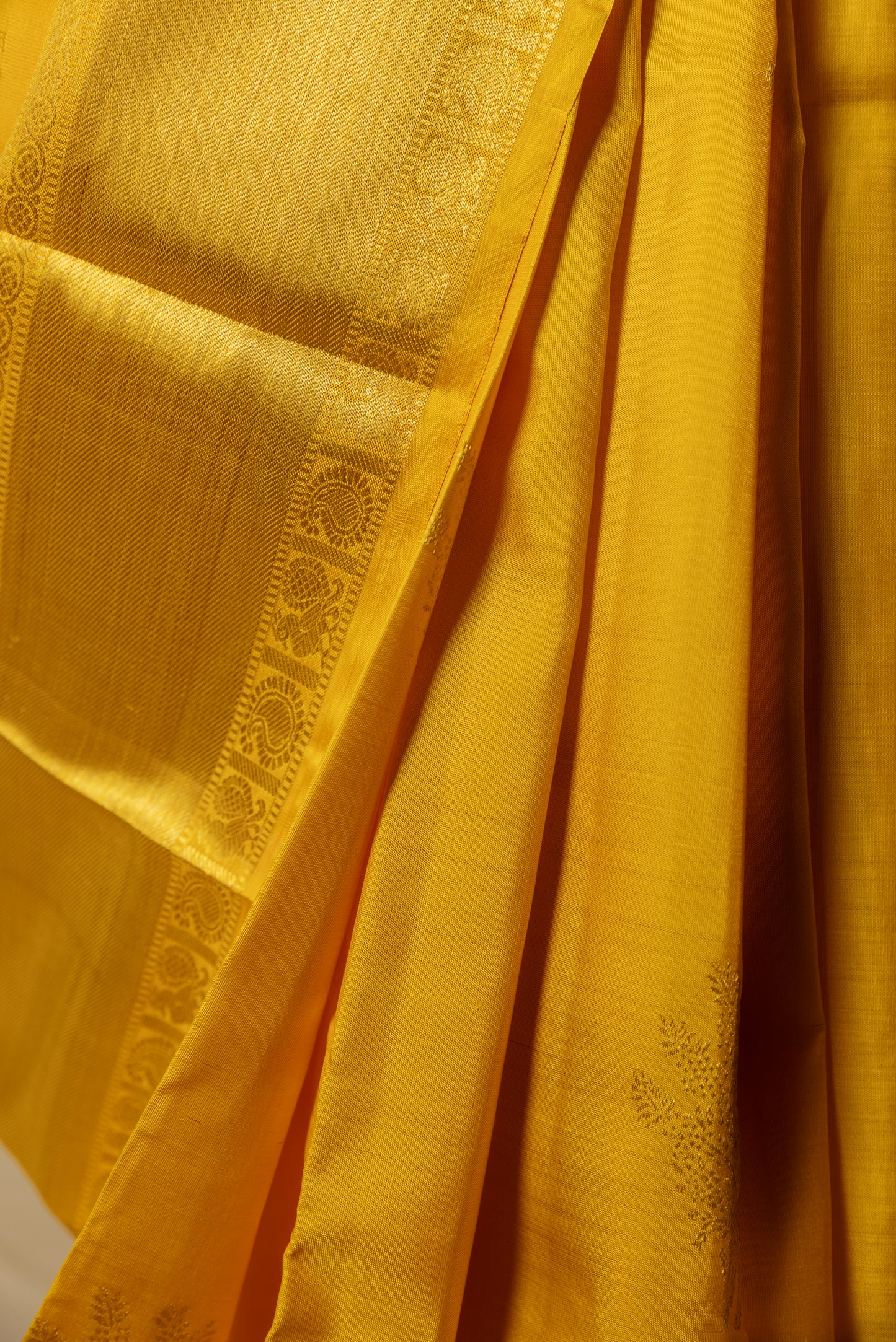 Yellow and gold Kanjivaram silk saree