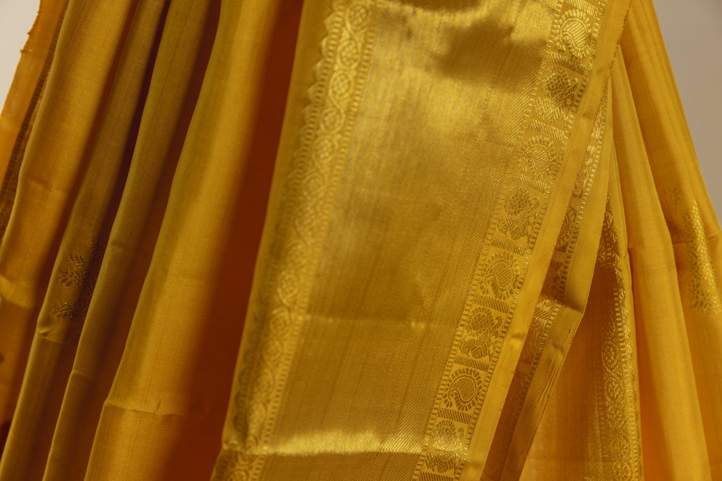 Yellow and gold Kanjivaram silk saree