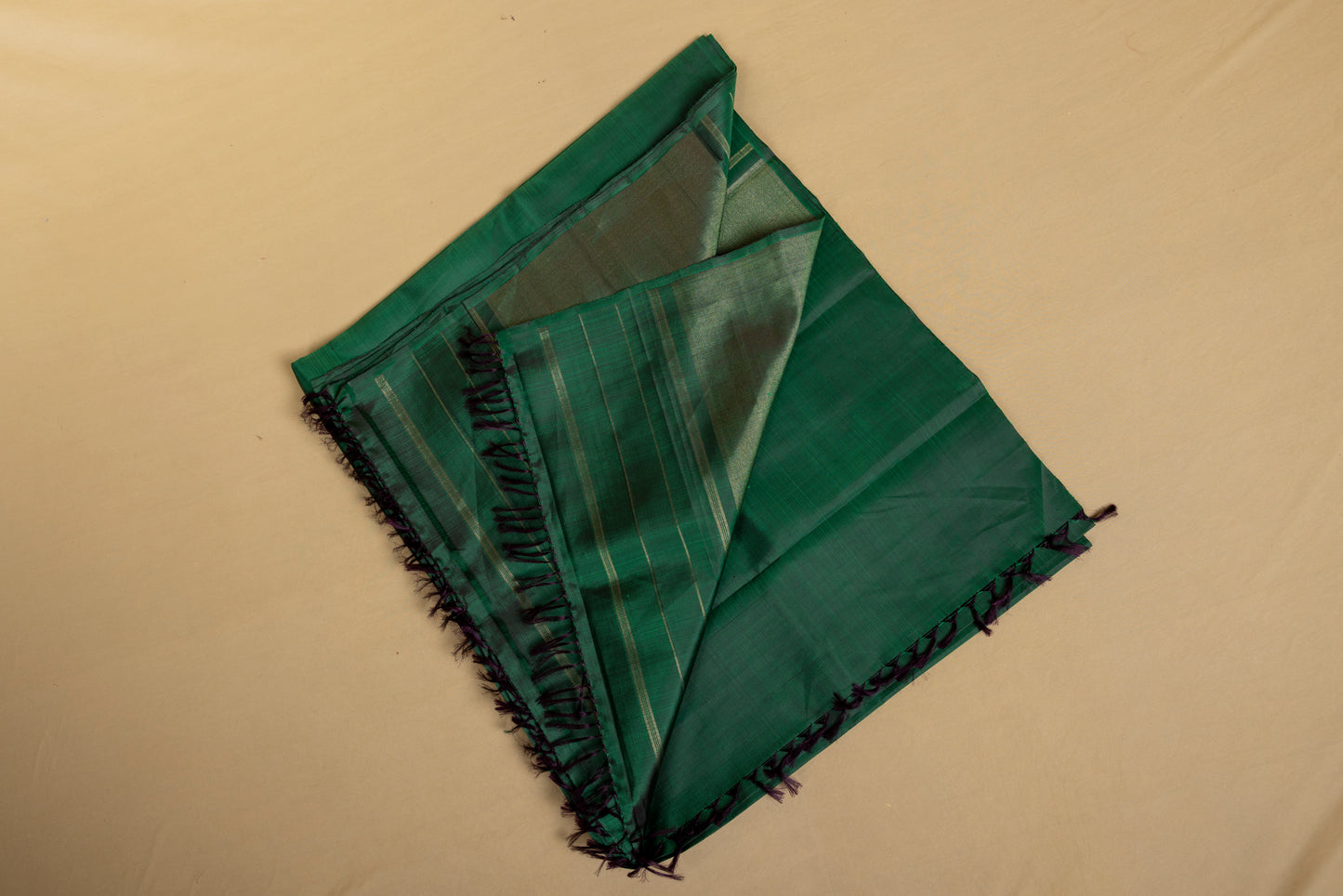 Green Kanjivaram saree with gold pin stripes