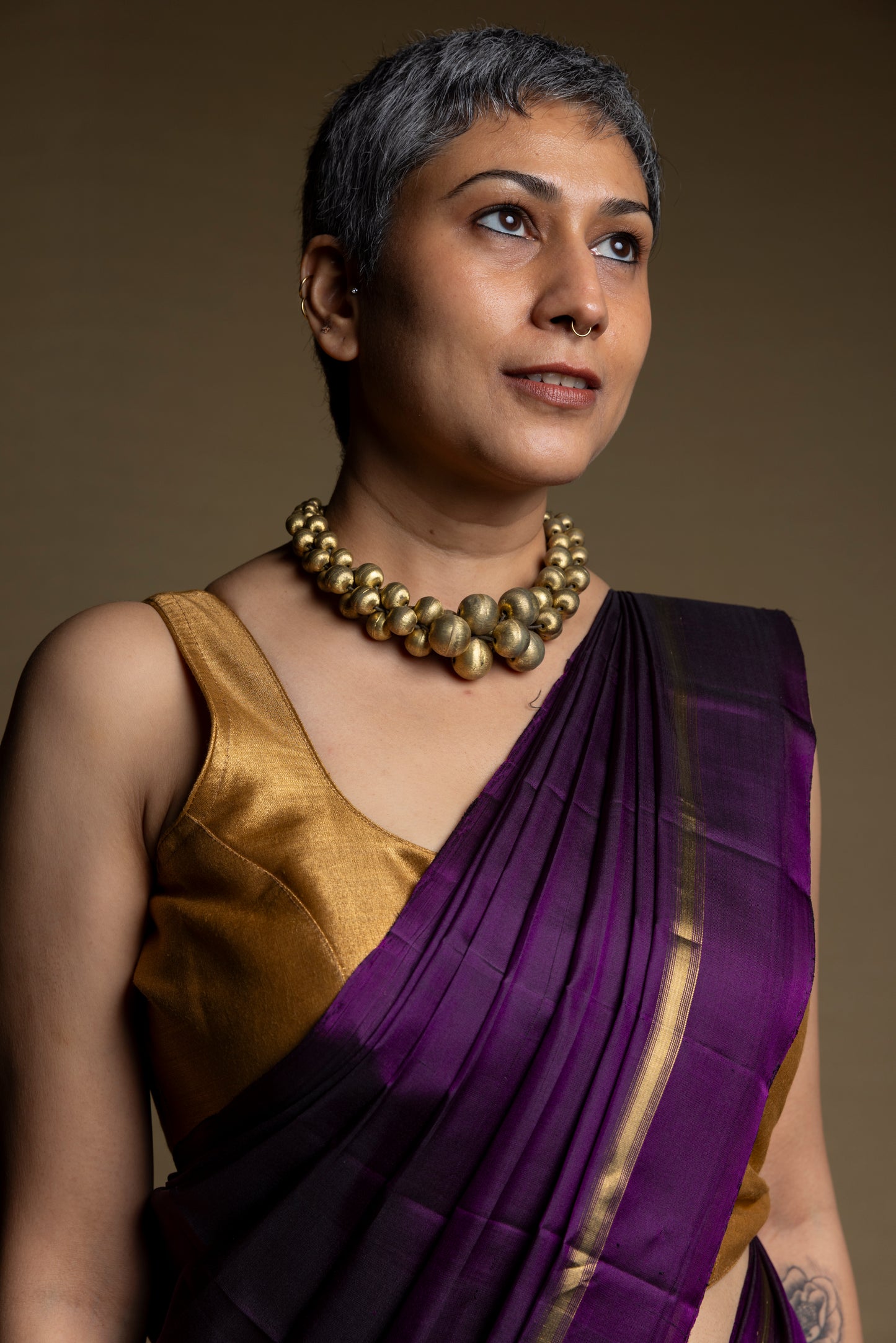 Purple Kanjivaram saree with thin gold zari border