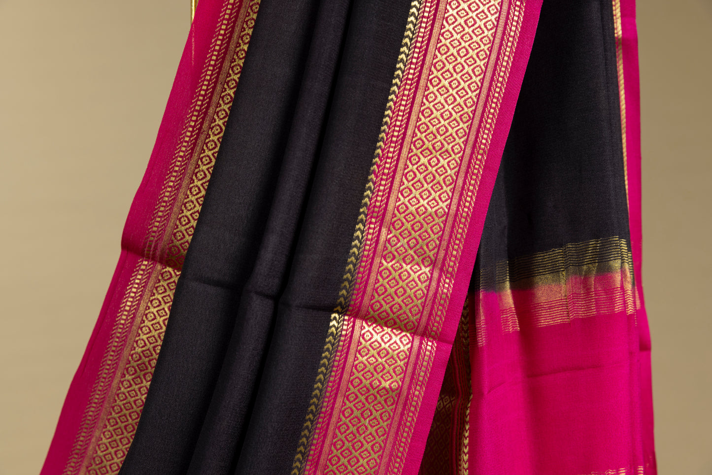 Black and pink mysore silk saree with gold border