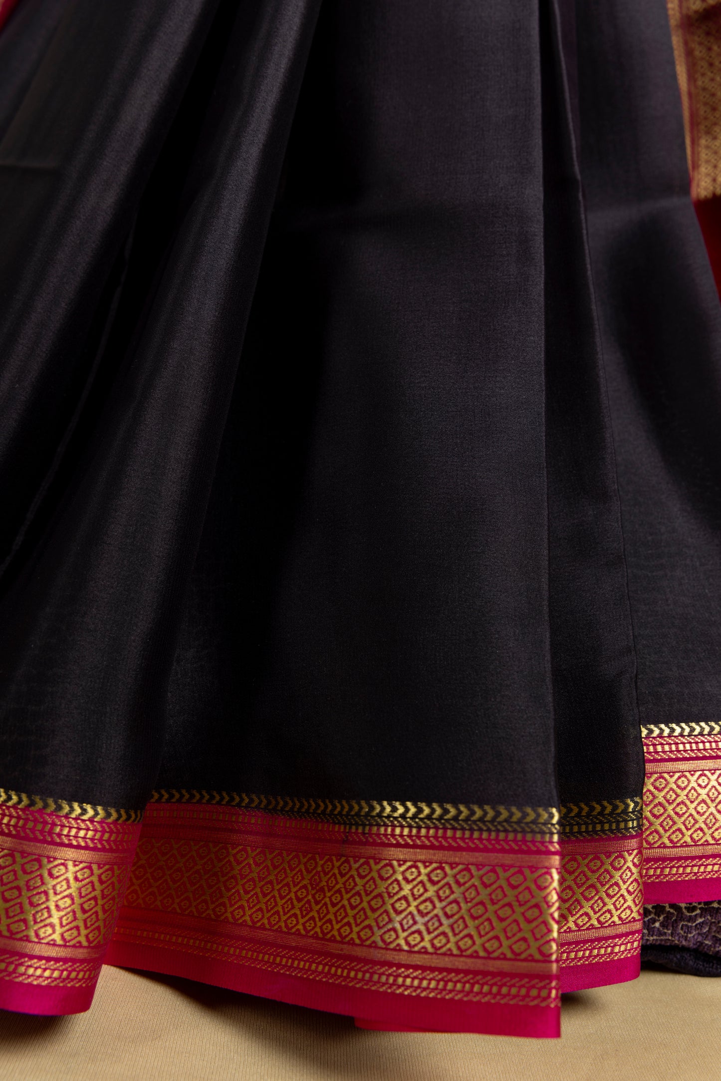 Black and pink mysore silk saree with gold border