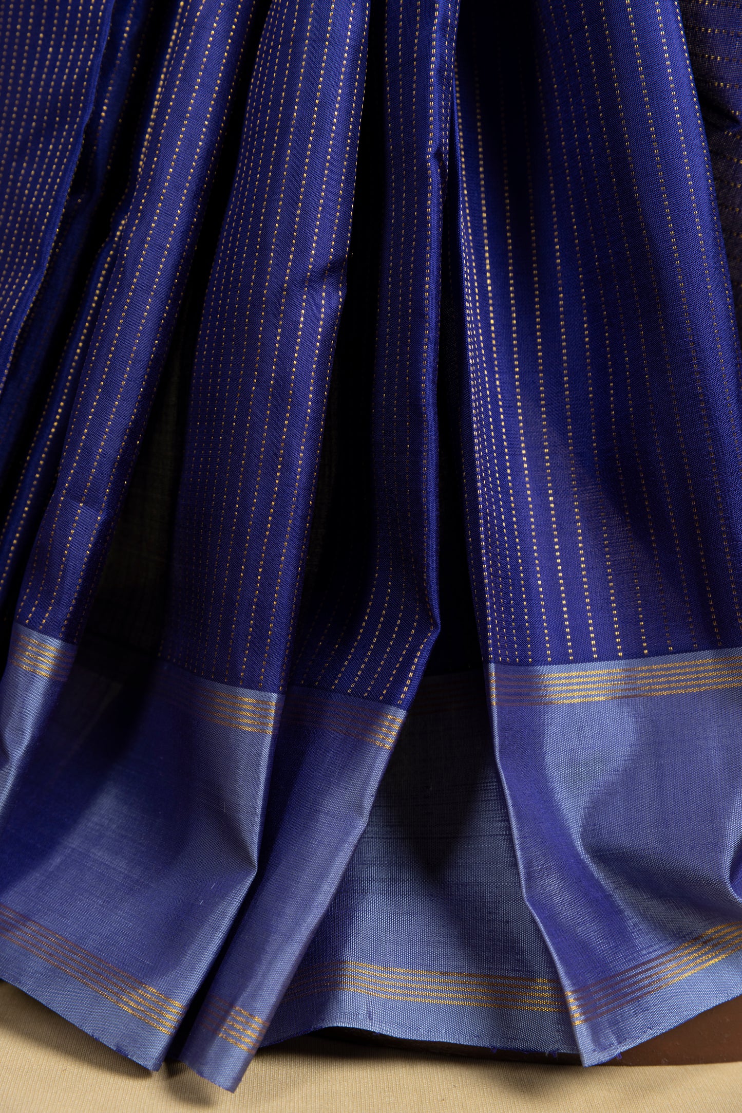 Blue dual tone Kanjivaram saree with gold pin stripes