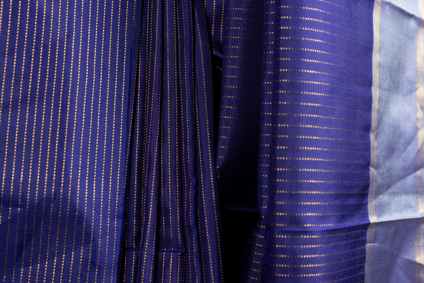 Blue dual tone Kanjivaram saree with gold pin stripes