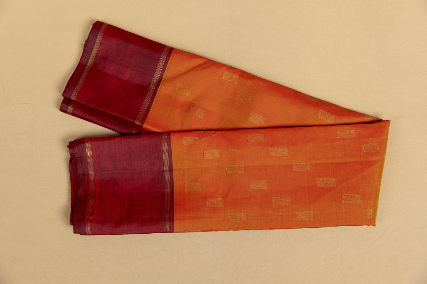 Orange and maroon Kanjivaram saree