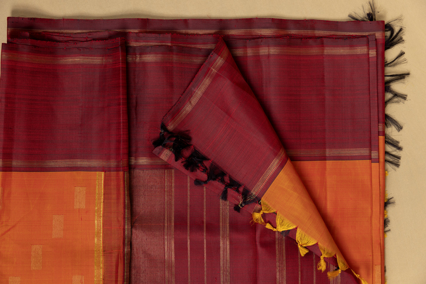 Orange and maroon Kanjivaram saree