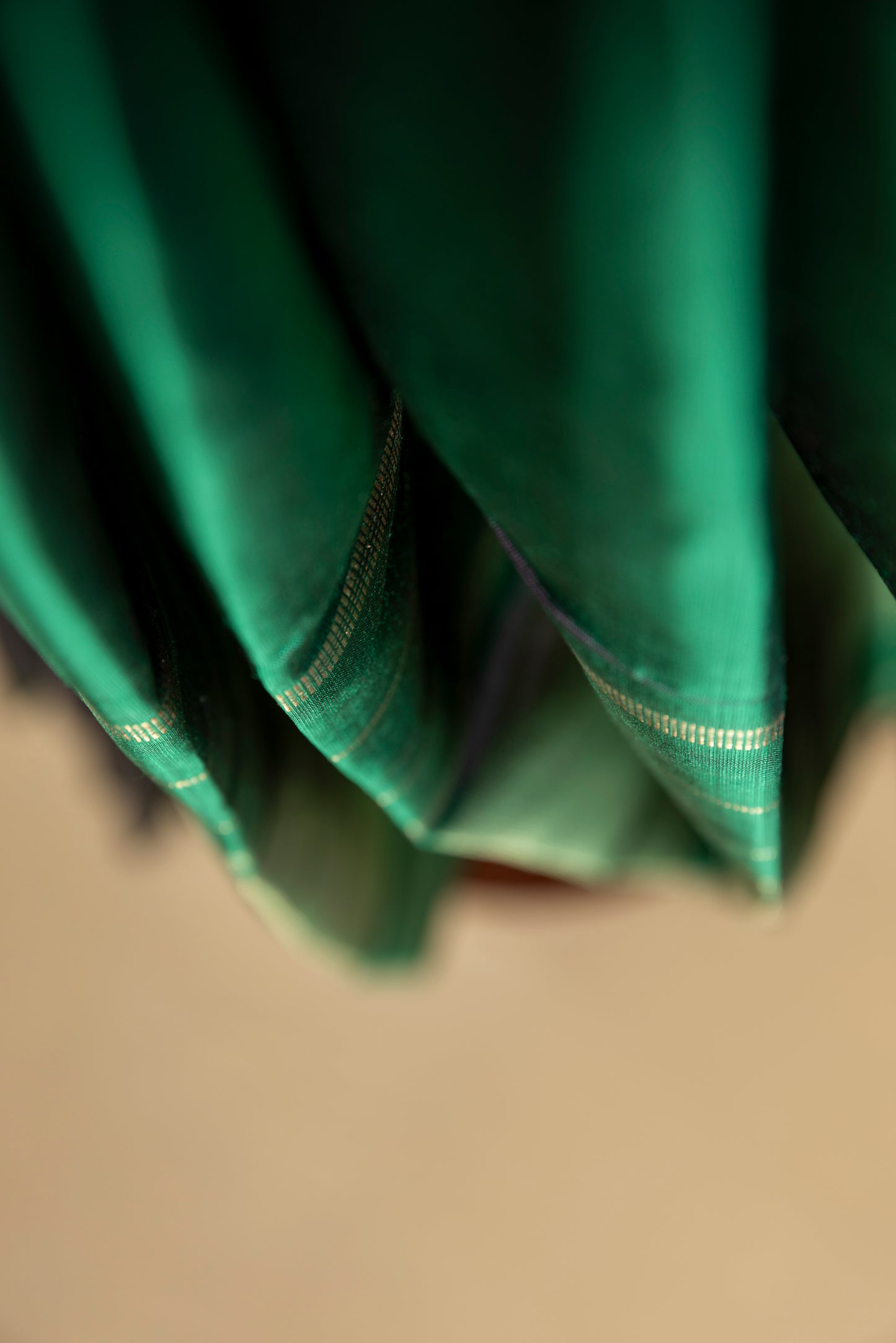 Green Kanjivaram saree with gold pin stripes