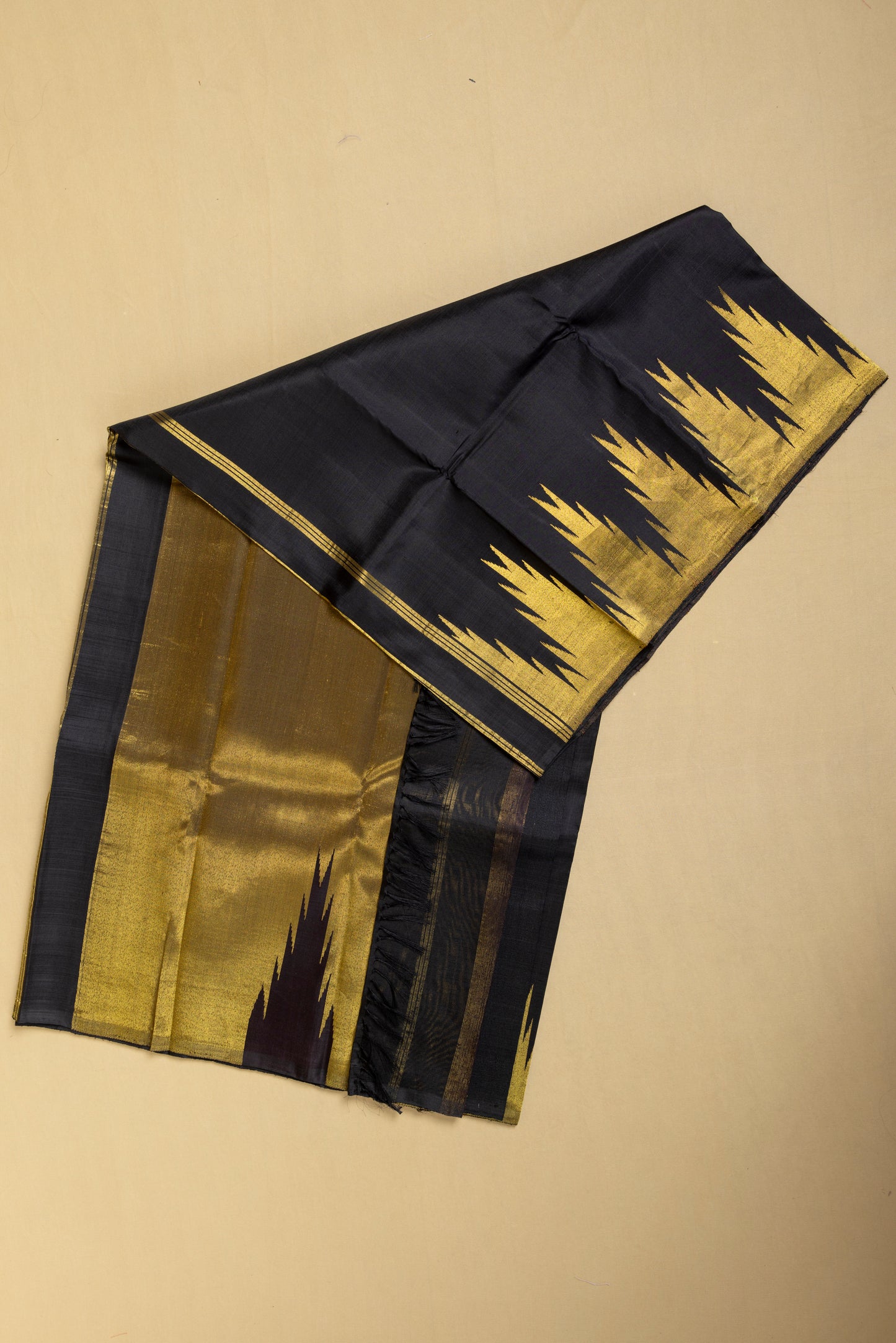 Black and gold Kanjivaram saree with gold temple border