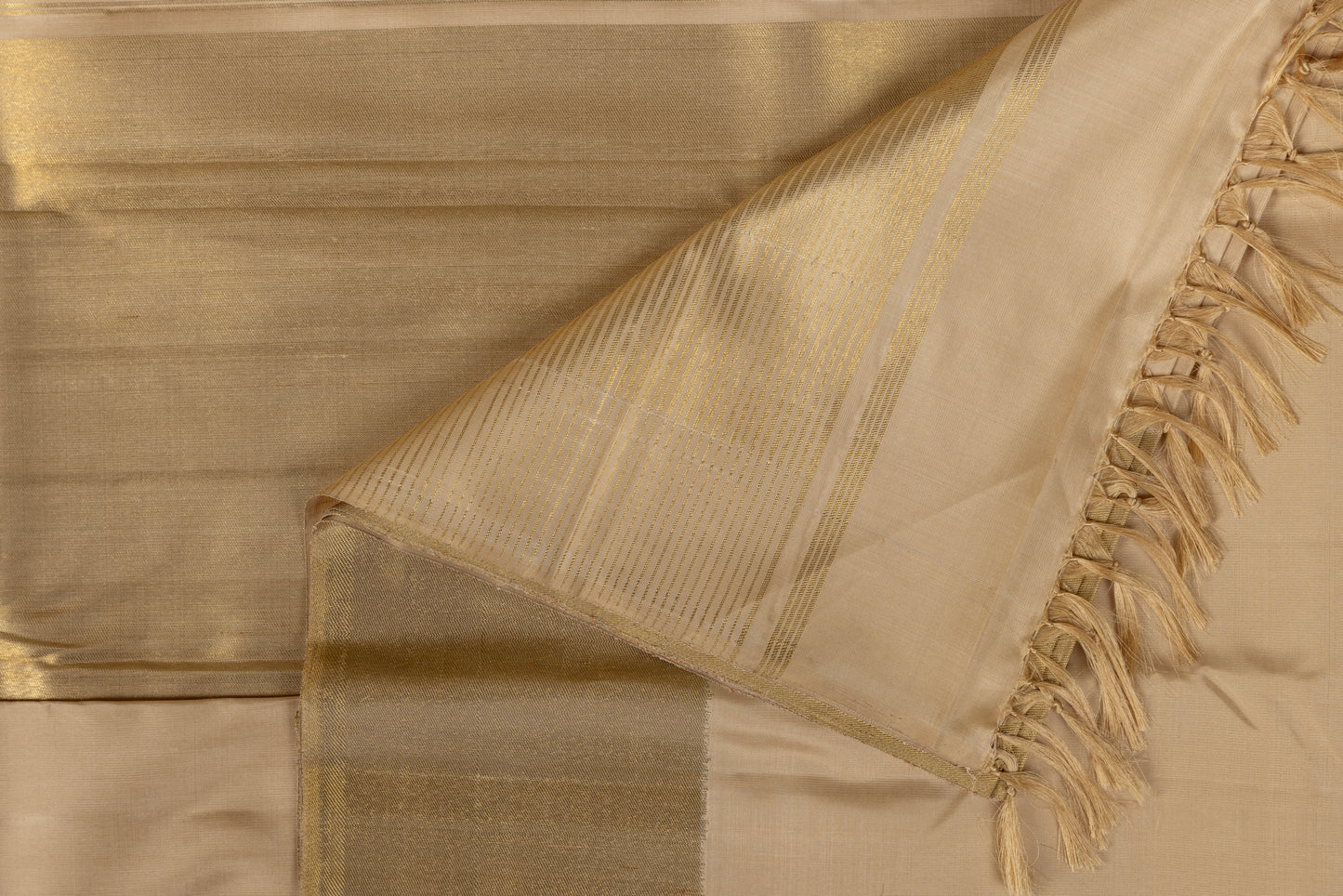 Gold and cream Kanjivaram saree with gold zari pallu