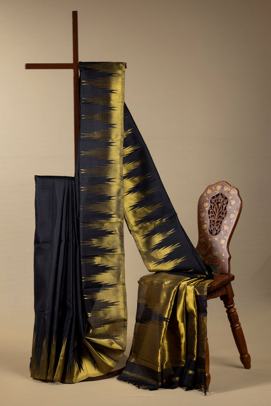 Black and gold Kanjivaram saree with gold temple border