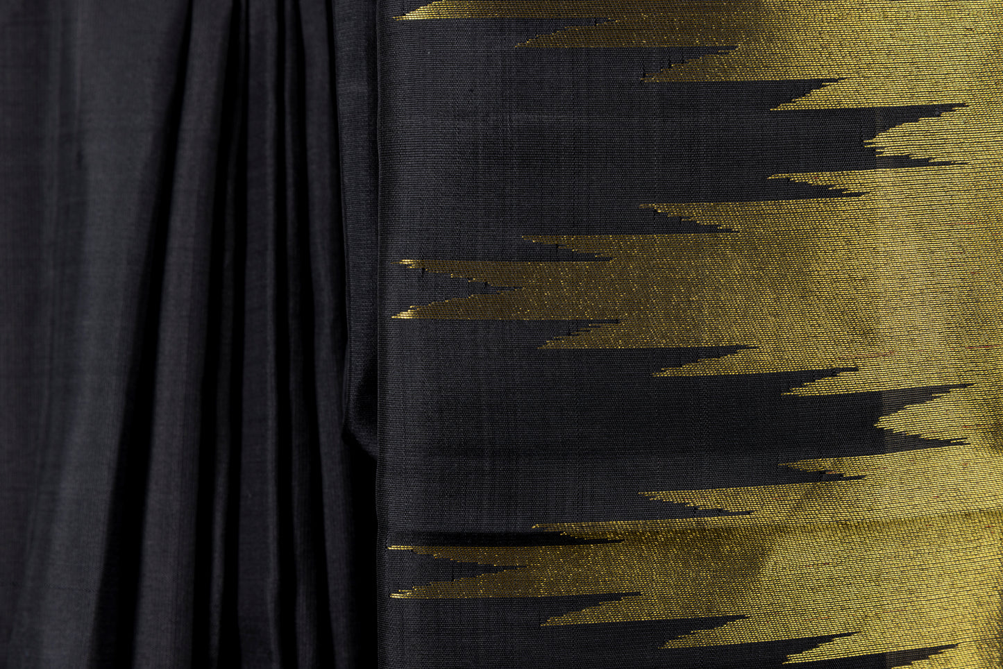 Black and gold Kanjivaram saree with gold temple border