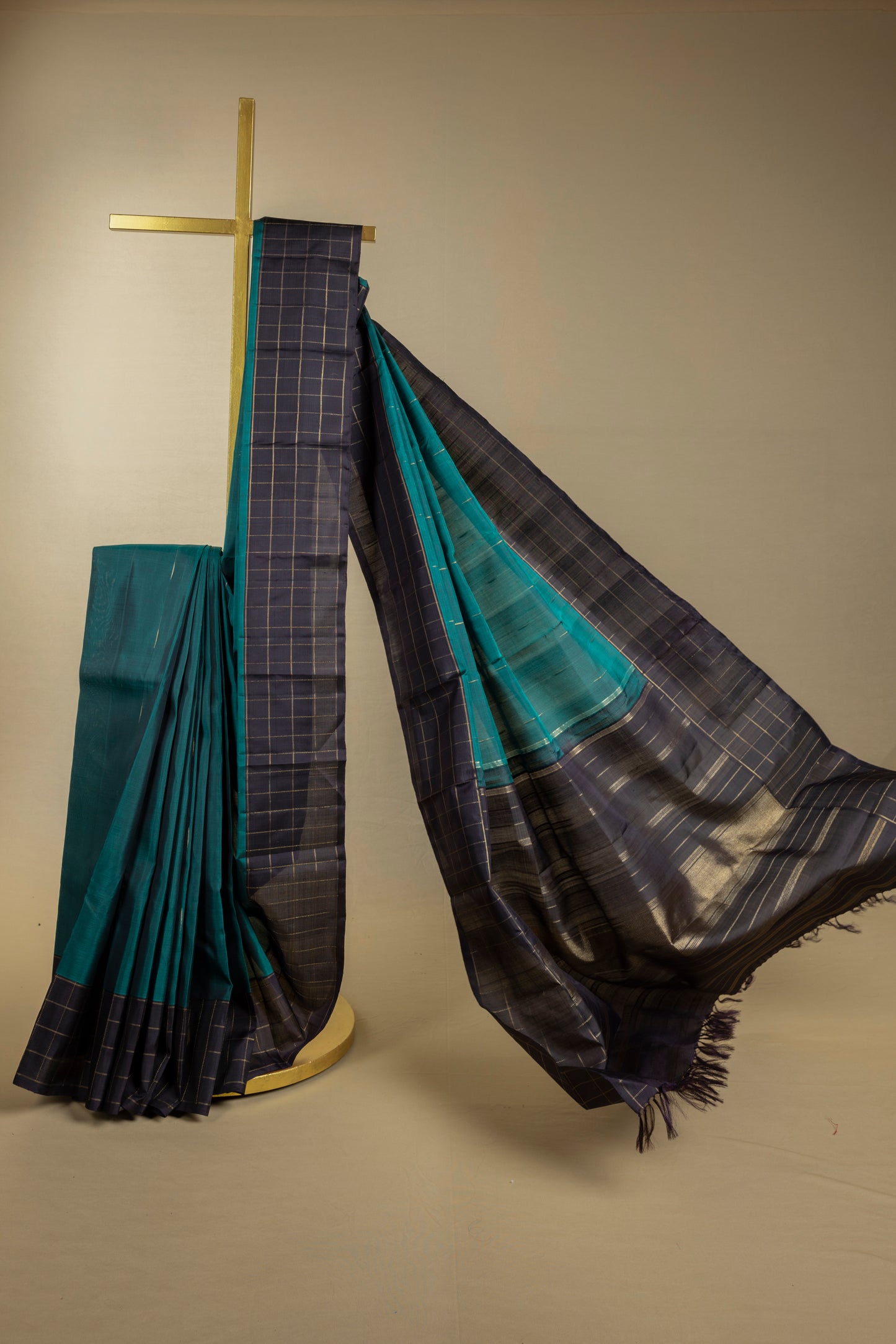 Black and green Kanjivaram saree with gold checks