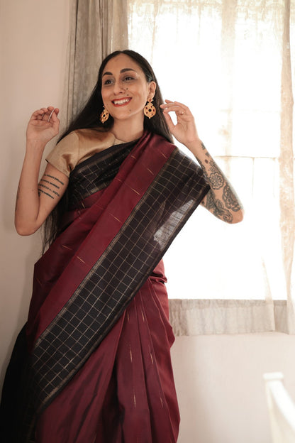 Chauka - Maroon and Black Kanjivaram Silk Saree with Black Gold chequered border and gold pin drop motifs